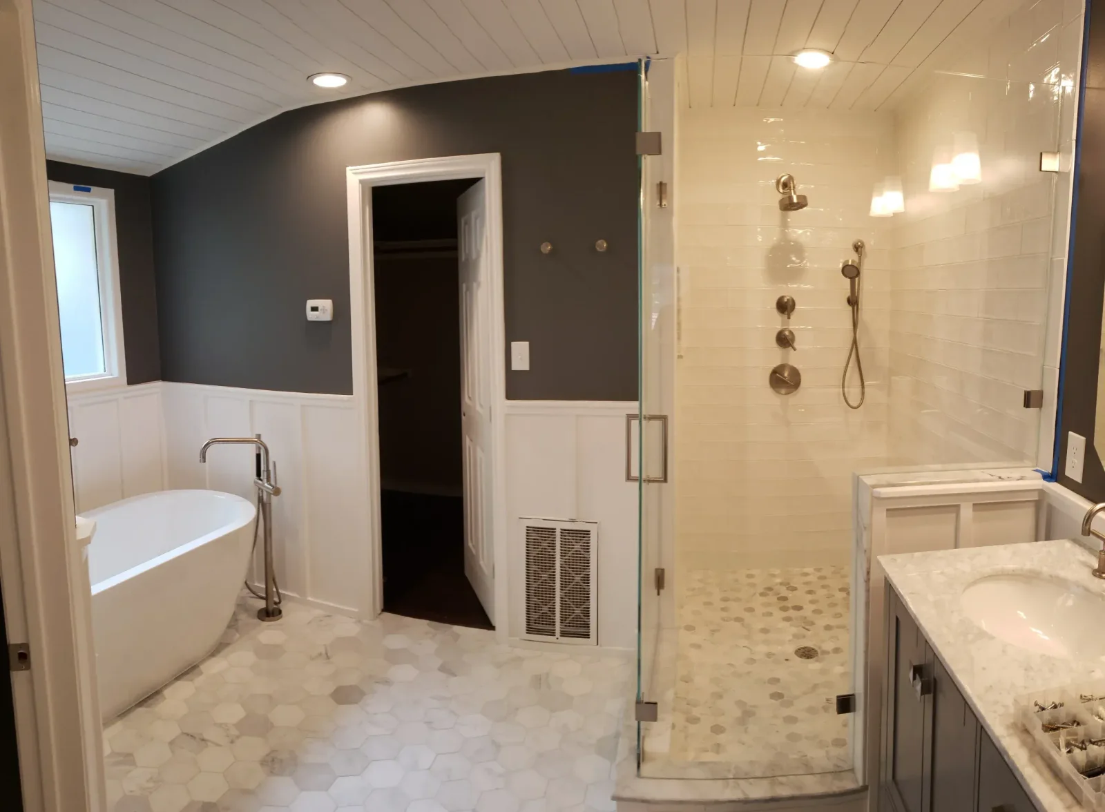 Modern bathroom with custom tile work and luxury fixtures in an Austin home.